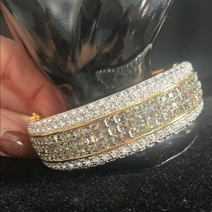 Joan Rivers Classics Collection 
Gold & Blk Rose ring , Diamond &blk bracelet
8